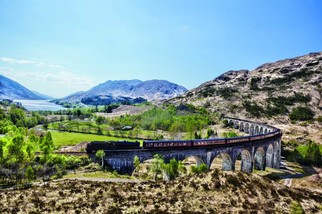 Glenfinnan Railway Viaduct in Scotland with the Jacobite steam t