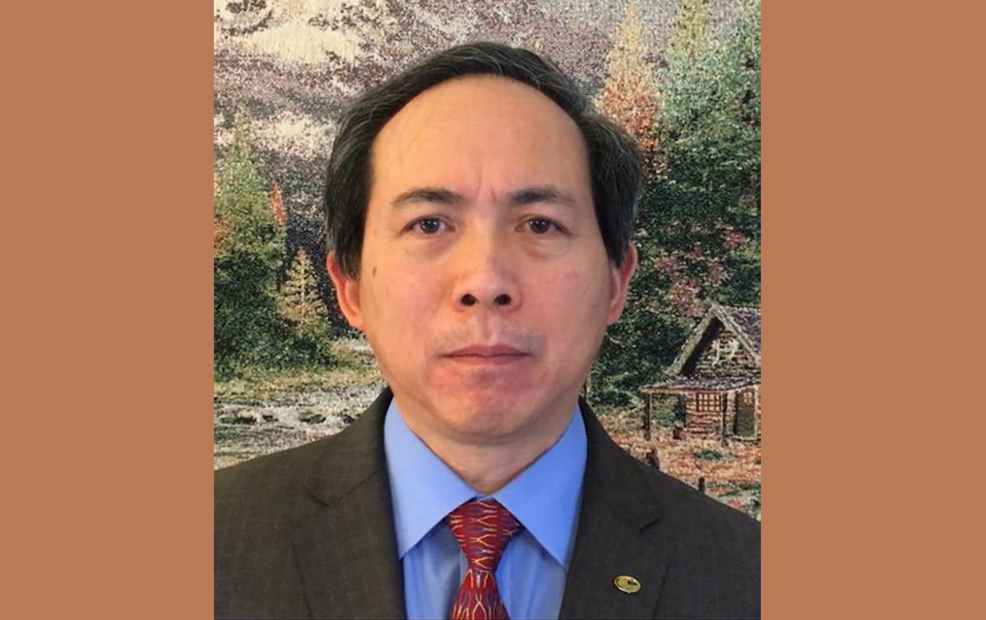 李燕光牧師。