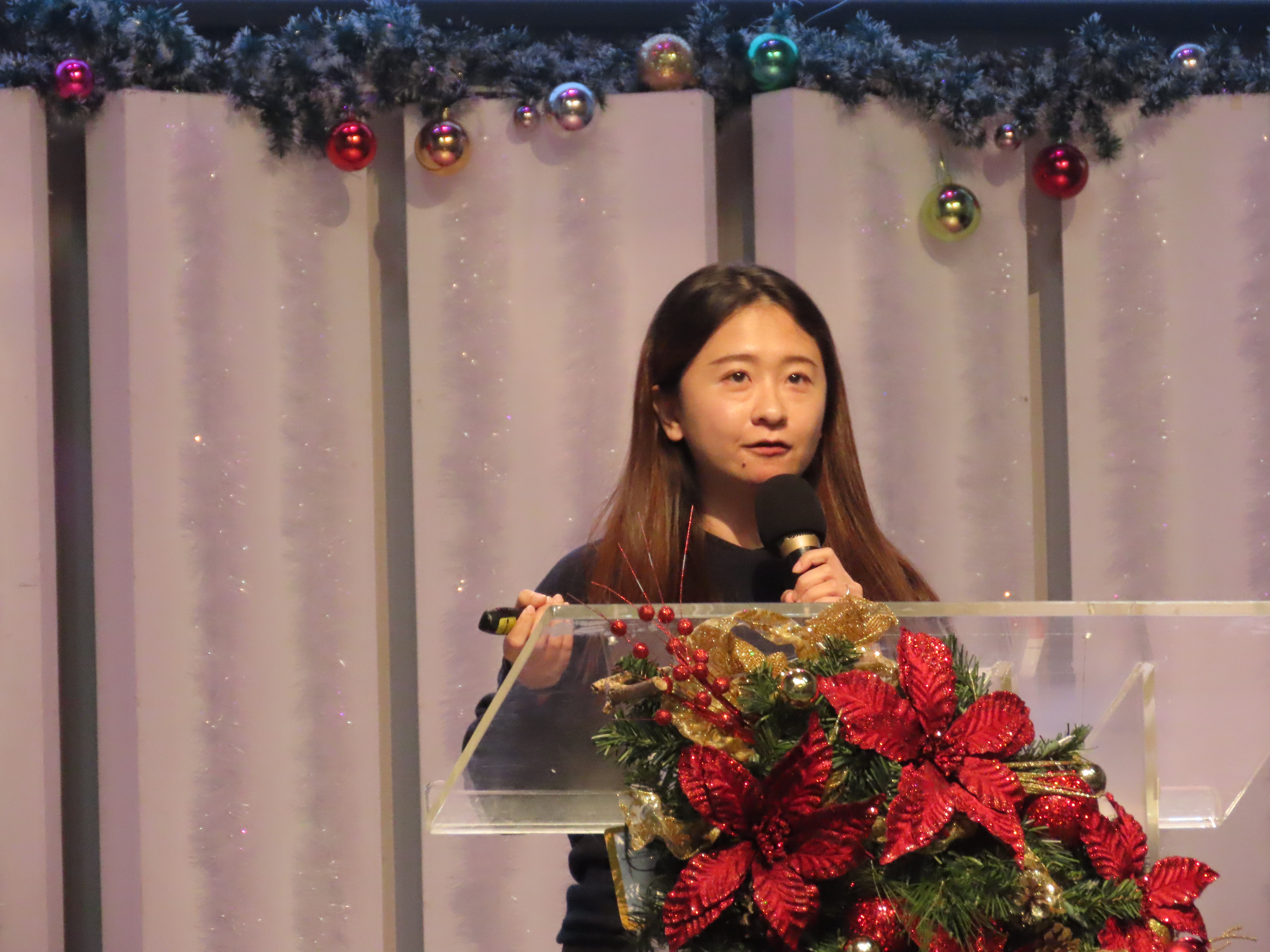 曾秋婷姊妹見證。(圖/李容珍攝影)