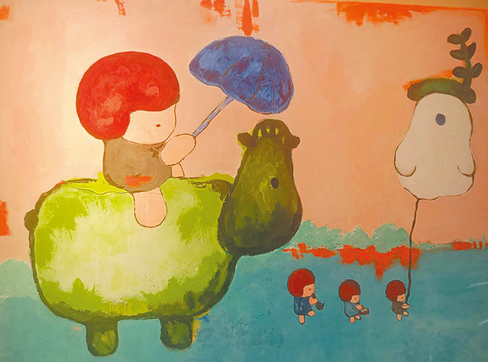 享譽國際的紅髮Moi是寧芮潔重要的創作主角。（圖/陳秀雯攝影）